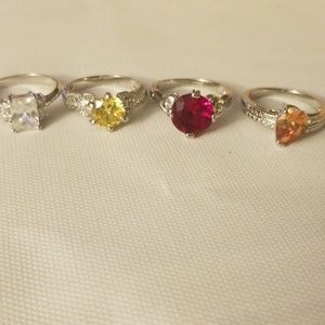 Lot of 4 rings,  costume sizes 6-7
